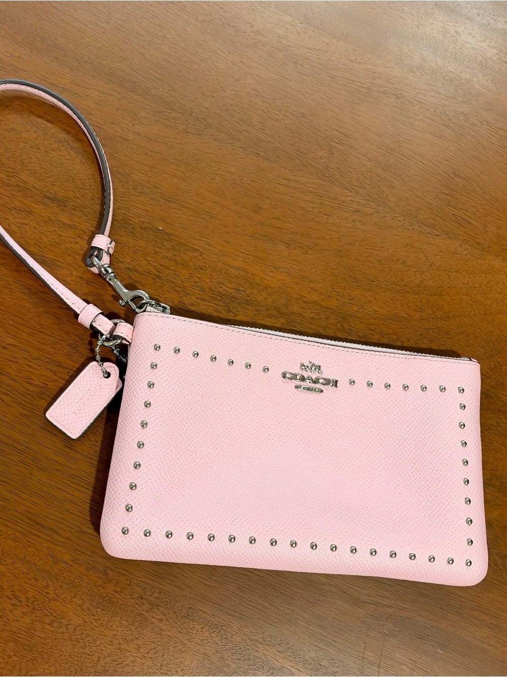 Coach Pale Pink Studded Leather Wristlet